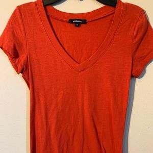 bright orange v-neck tee